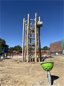 New playground structure at The Rec made of natural wood and ropes