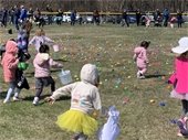 Kids running around during an egg hunt
