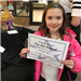 Girl Holding Fine Art Festival Certificate