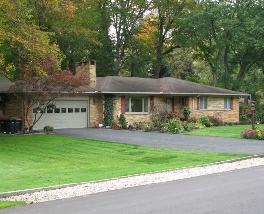 A Small Brick House with a Small Lawn